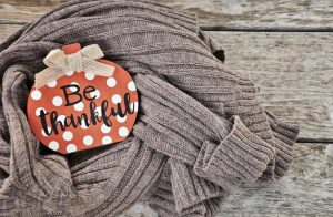 Be Thankful decoration on top of jumper emotional-benefits-of-work